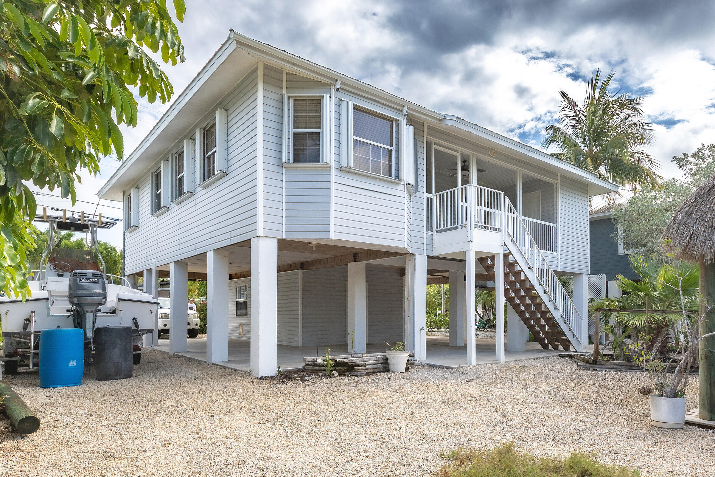 22808 Privateer Drive Cudjoe, FL 33042 - Photo 21 of 28 a view of a house with a yard and plants