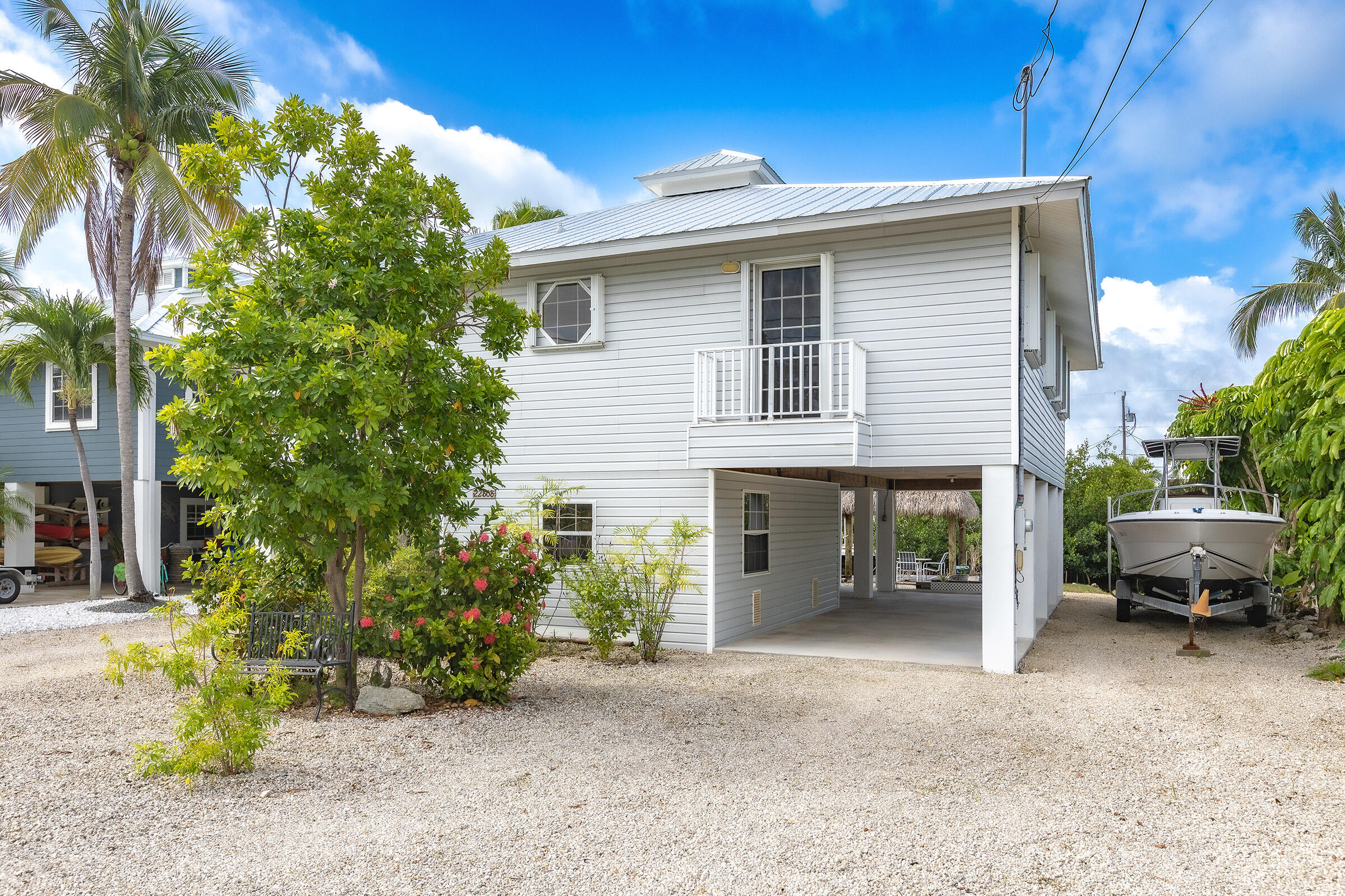 22808 Privateer Drive Cudjoe, FL 33042 - Photo 23 of 28 a view of a house with a patio
