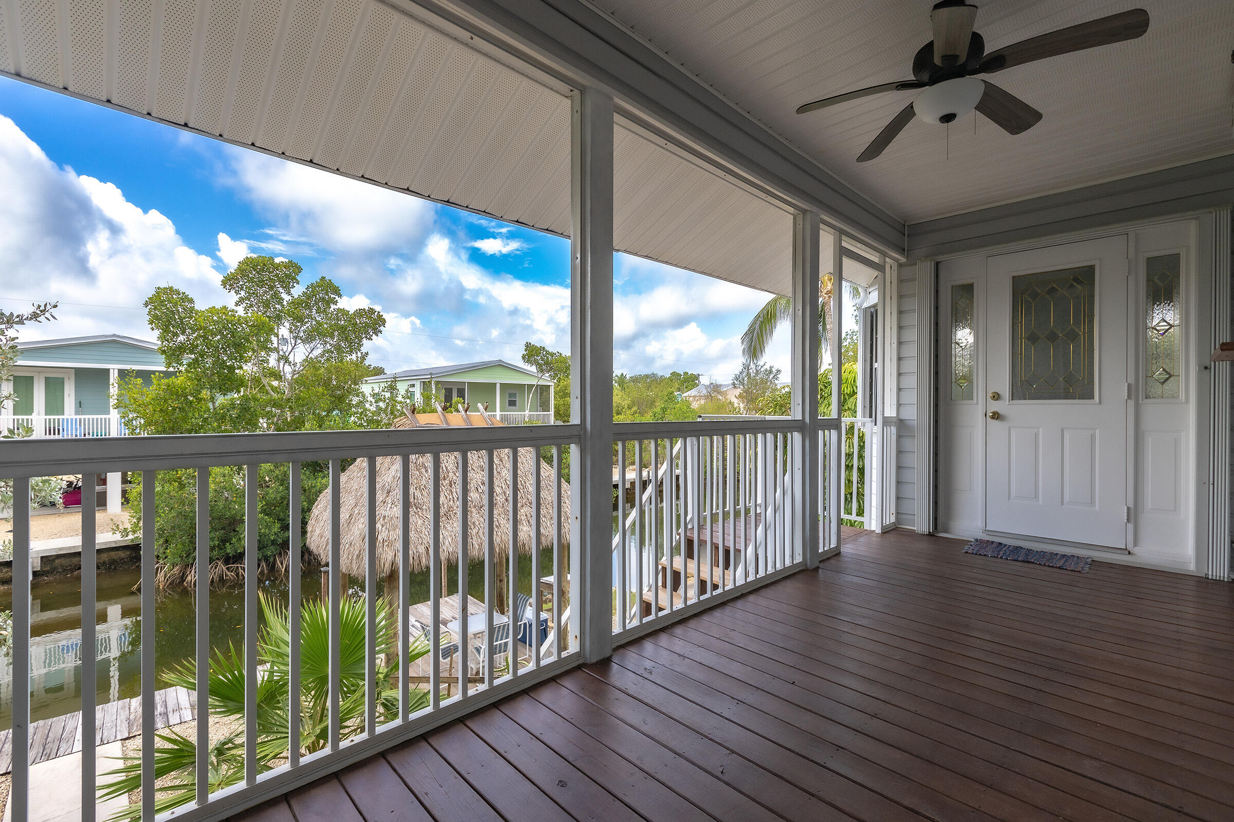 22808 Privateer Drive Cudjoe, FL 33042 - Photo 26 of 28 a view of a balcony with wooden floor