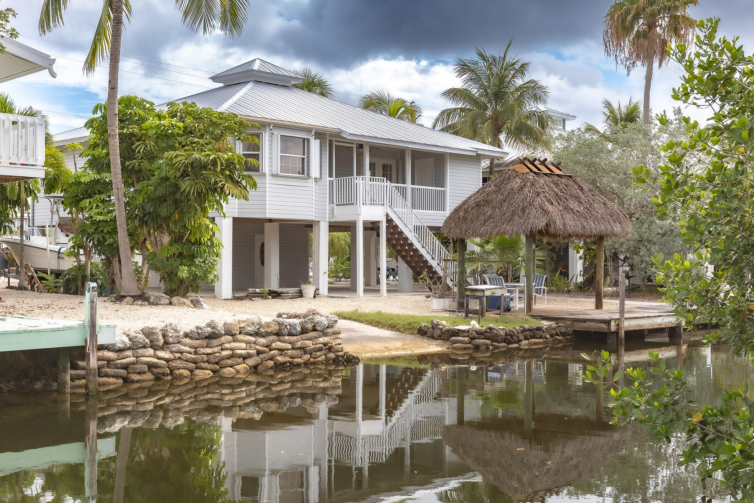 22808 Privateer Drive Cudjoe, FL 33042 - Photo 28 of 28 a front view of house with yard