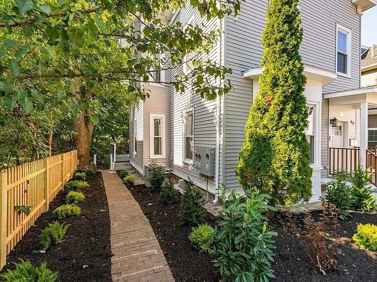 49 Alpine Street, Unit 2 Boston, MA 02119 - Photo 17 of 18 a view of a pathway with house on both side