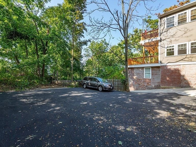 49 Alpine Street, Unit 2 Boston, MA 02119 - Photo 18 of 18 a view of a car parked in front of a building