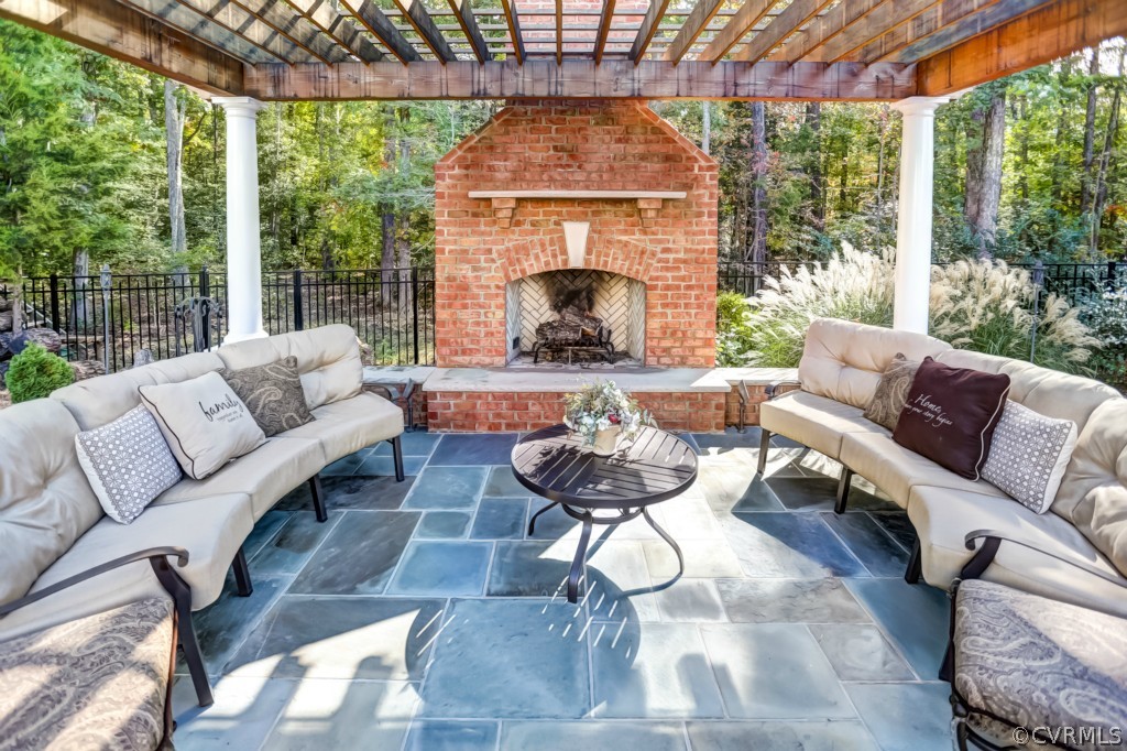 422 Wellfield Road Manakin-Sabot, VA 23103 - Photo 26 of 31 Wood burning fireplace with pergola for shade