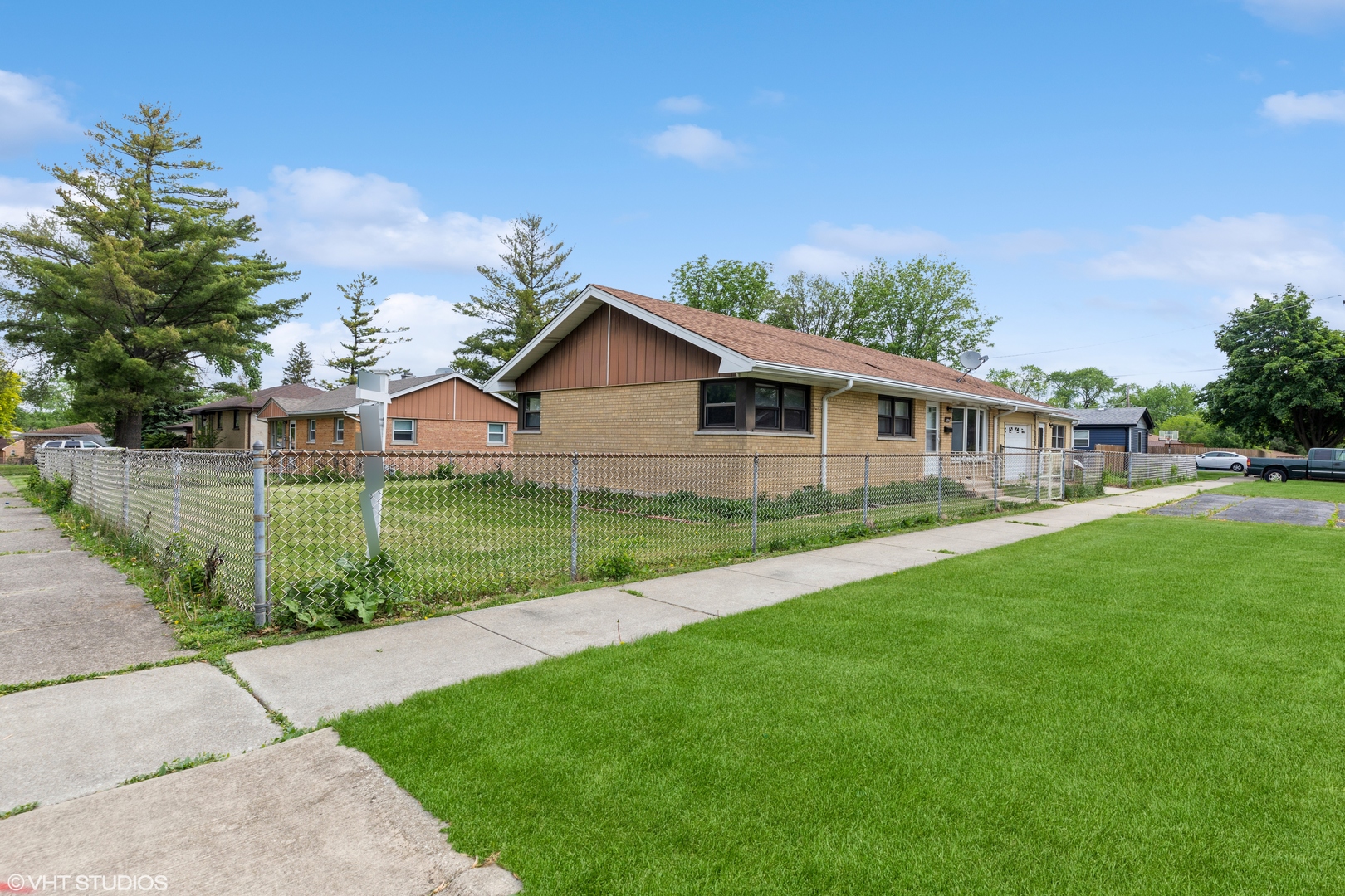 6054 107th Street Chicago Ridge, IL 60415 - Photo 3 of 27 a view of a house with a yard and potted plants