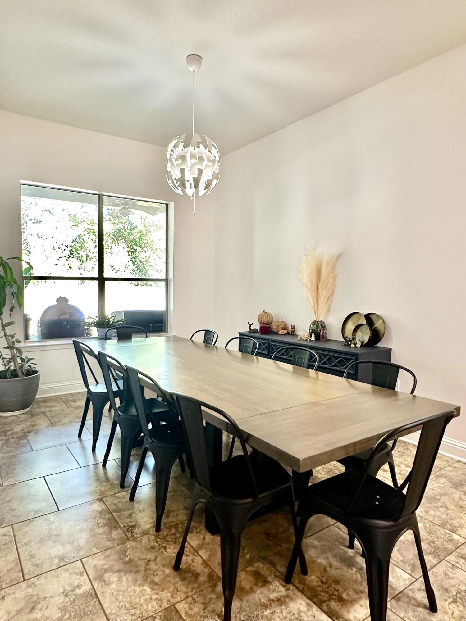 5930 Wind Trace Road Crestview, FL 32536 - Photo 27 of 68 a view of a dining room with furniture window and outside view