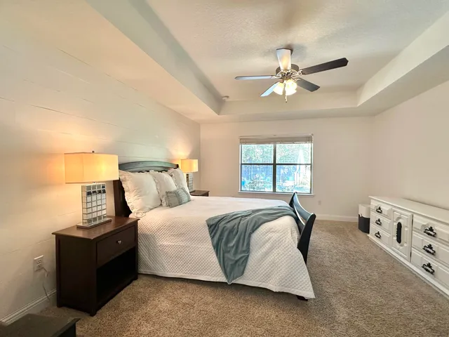 a workspace with furniture and a book shelf