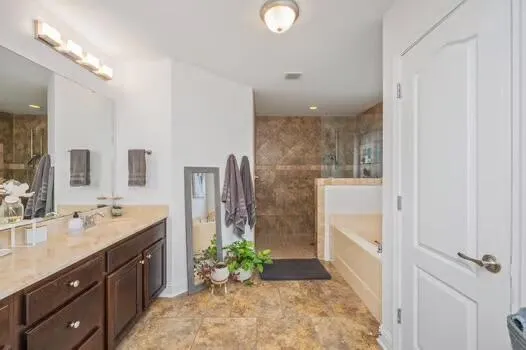 a bathroom with a shower curtain and a toilet