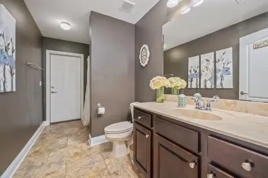 a view of a backyard with sitting area