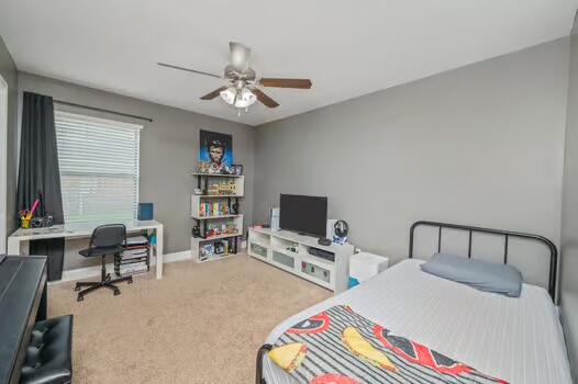 5930 Wind Trace Road Crestview, FL 32536 - Photo 44 of 68 a bedroom with furniture and a flat screen tv