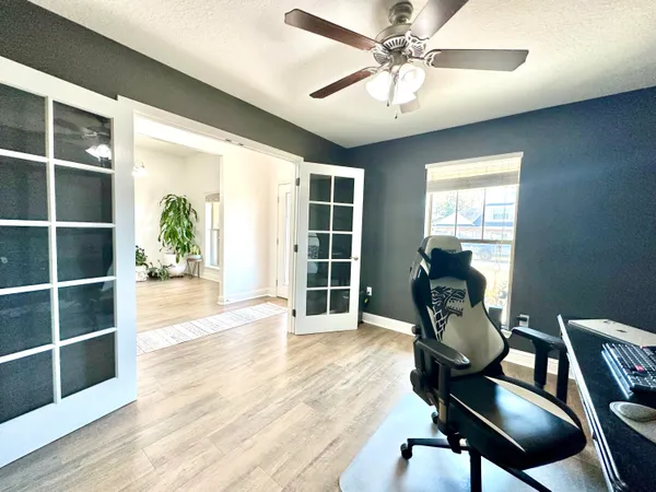 a front view of house with yard and seating area