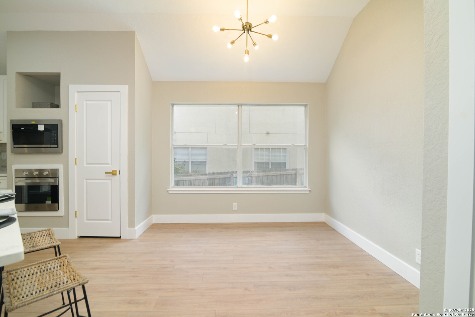 2155 North Ranch Estates Boulevard New Braunfels, TX 78130 - Photo 16 of 28 a view of livingroom with hardwood floor and a ceiling fan