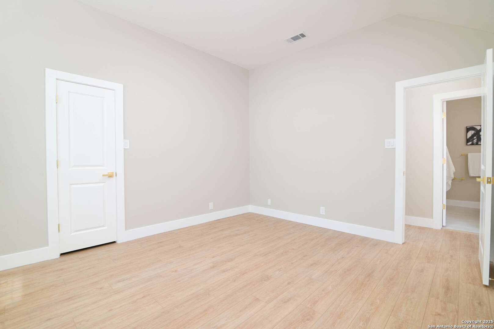 2155 North Ranch Estates Boulevard New Braunfels, TX 78130 - Photo 18 of 28 an empty room with wooden floor