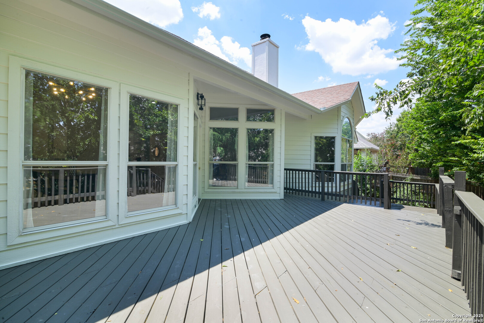 2155 North Ranch Estates Boulevard New Braunfels, TX 78130 - Photo 21 of 28 a view of balcony with wooden floor and seating space