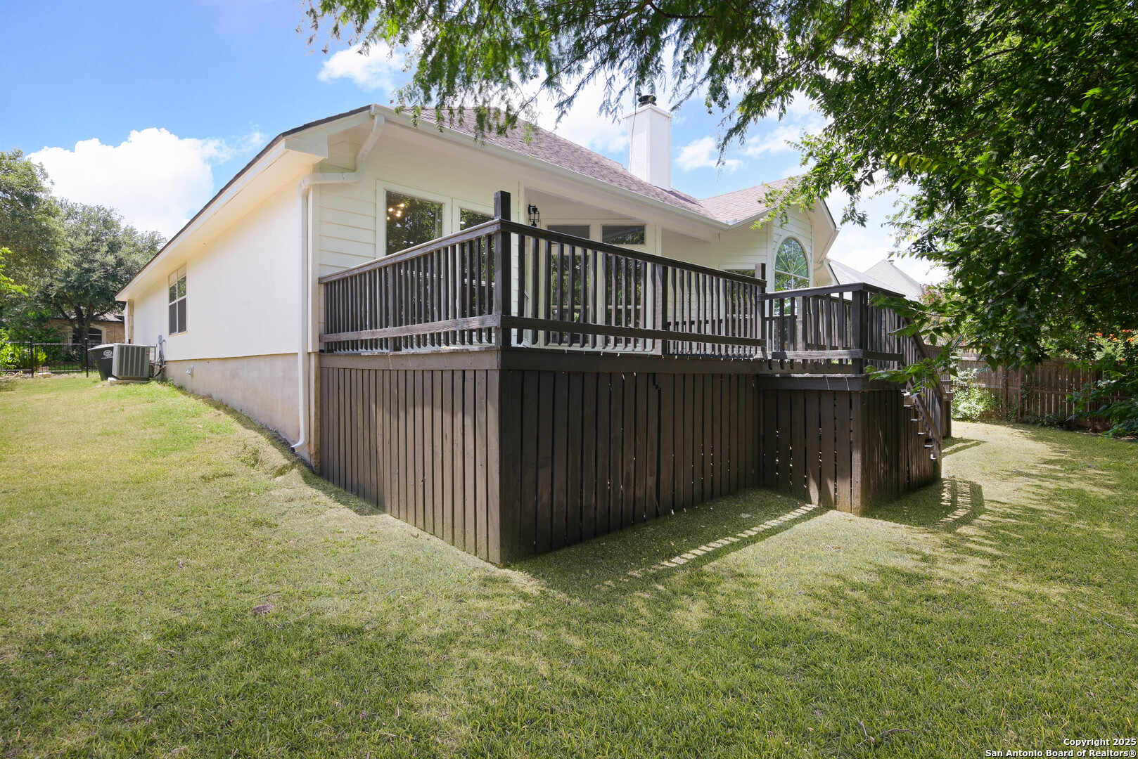 2155 North Ranch Estates Boulevard New Braunfels, TX 78130 - Photo 23 of 28 a view of a house with wooden fence