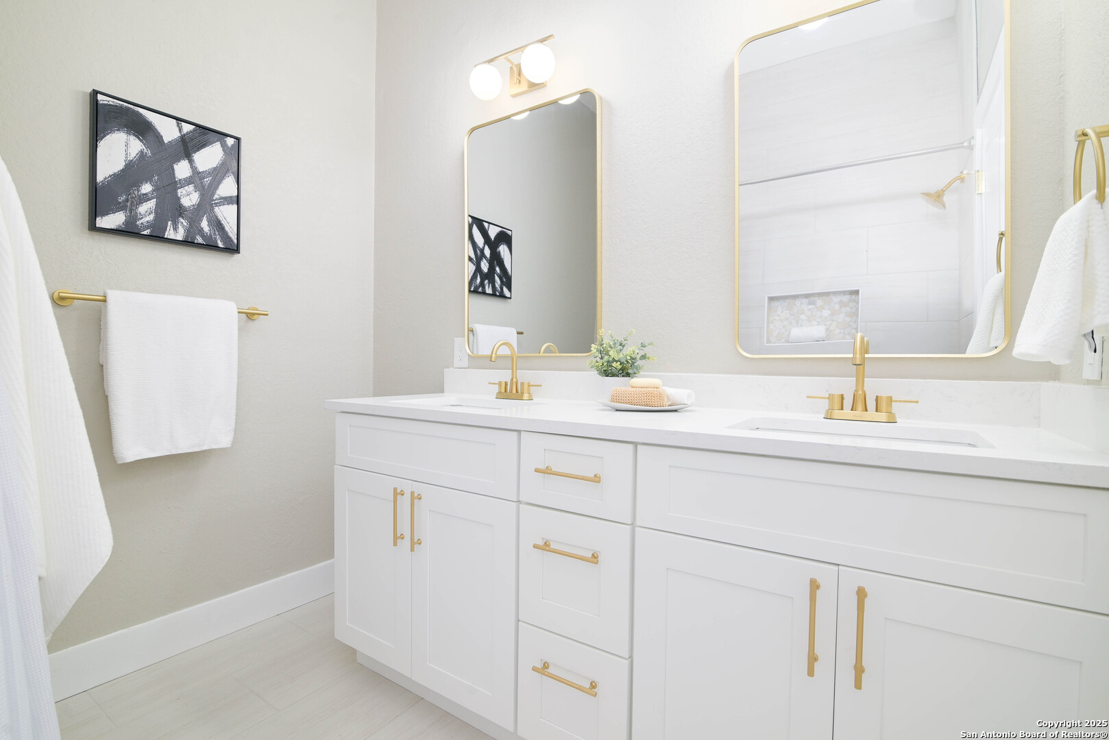 2155 North Ranch Estates Boulevard New Braunfels, TX 78130 - Photo 3 of 28 a bathroom with a sink and a mirror