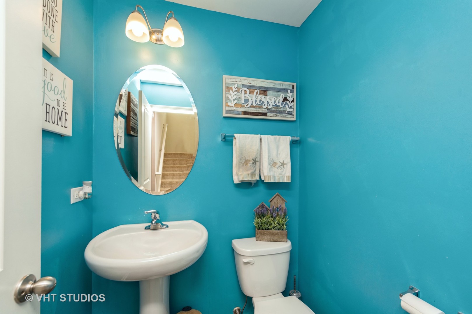 2403 Upland Road Pingree Grove, IL 60140 - Photo 14 of 15 a bathroom with a toilet sink and mirror