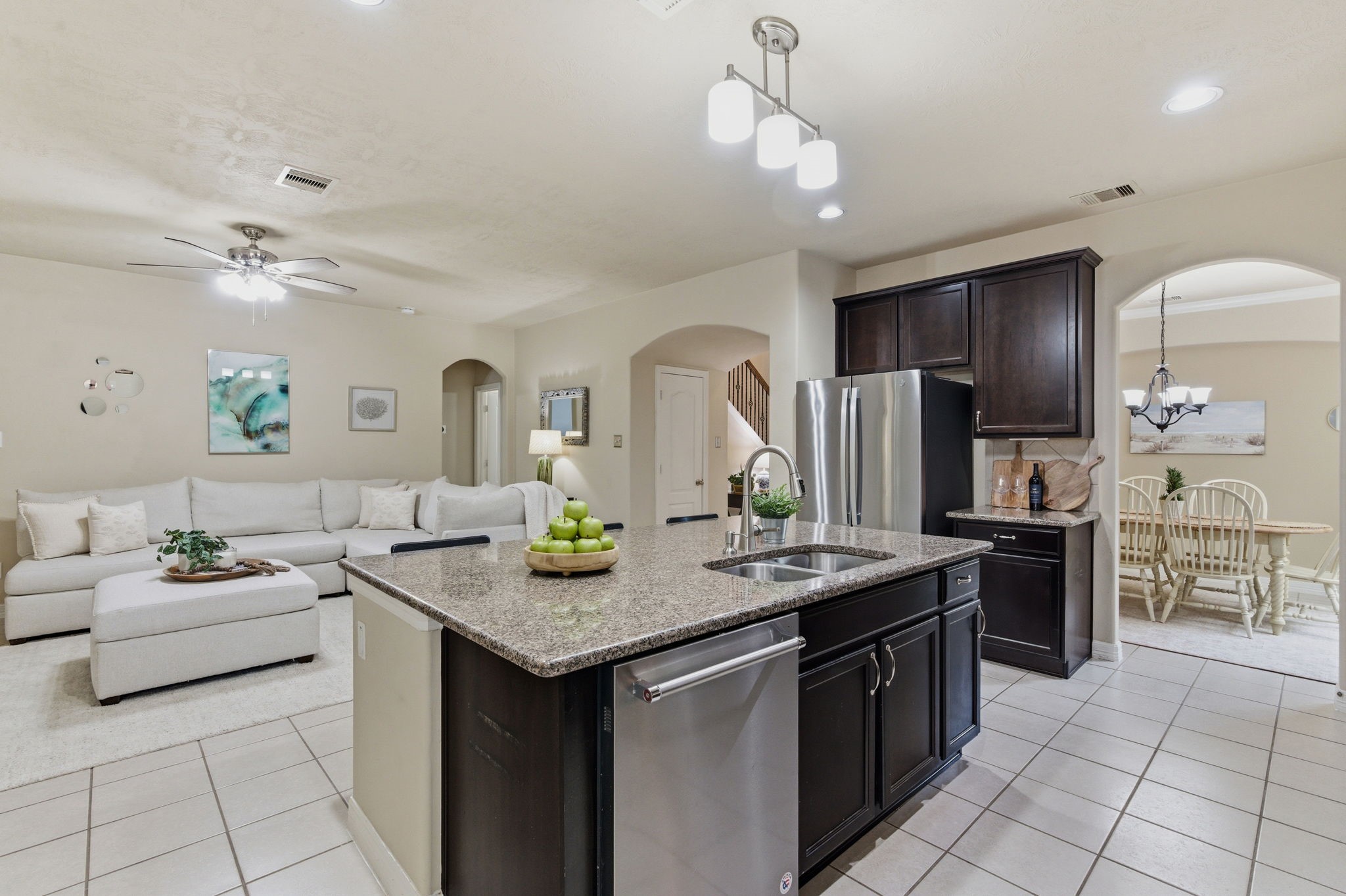 1737 Round Oak Lane Conroe, TX 77304 - Photo 15 of 39 a kitchen with sink refrigerator and cabinets