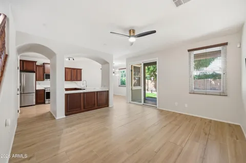 a view of a kitchen with a sink dishwasher and a refrigerator