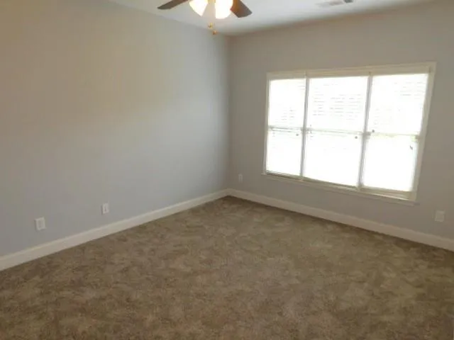 a bathroom with a sink mirror toilet and bathtub