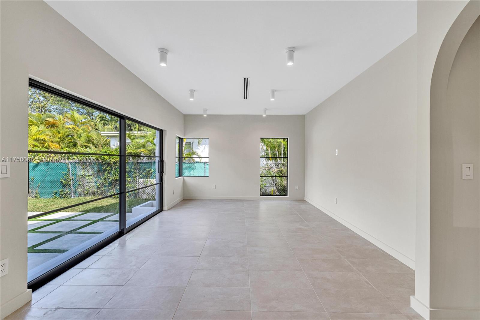 1323 Cleveland Road Miami Beach, FL 33141 - Photo 18 of 43 a view of a big room with windows
