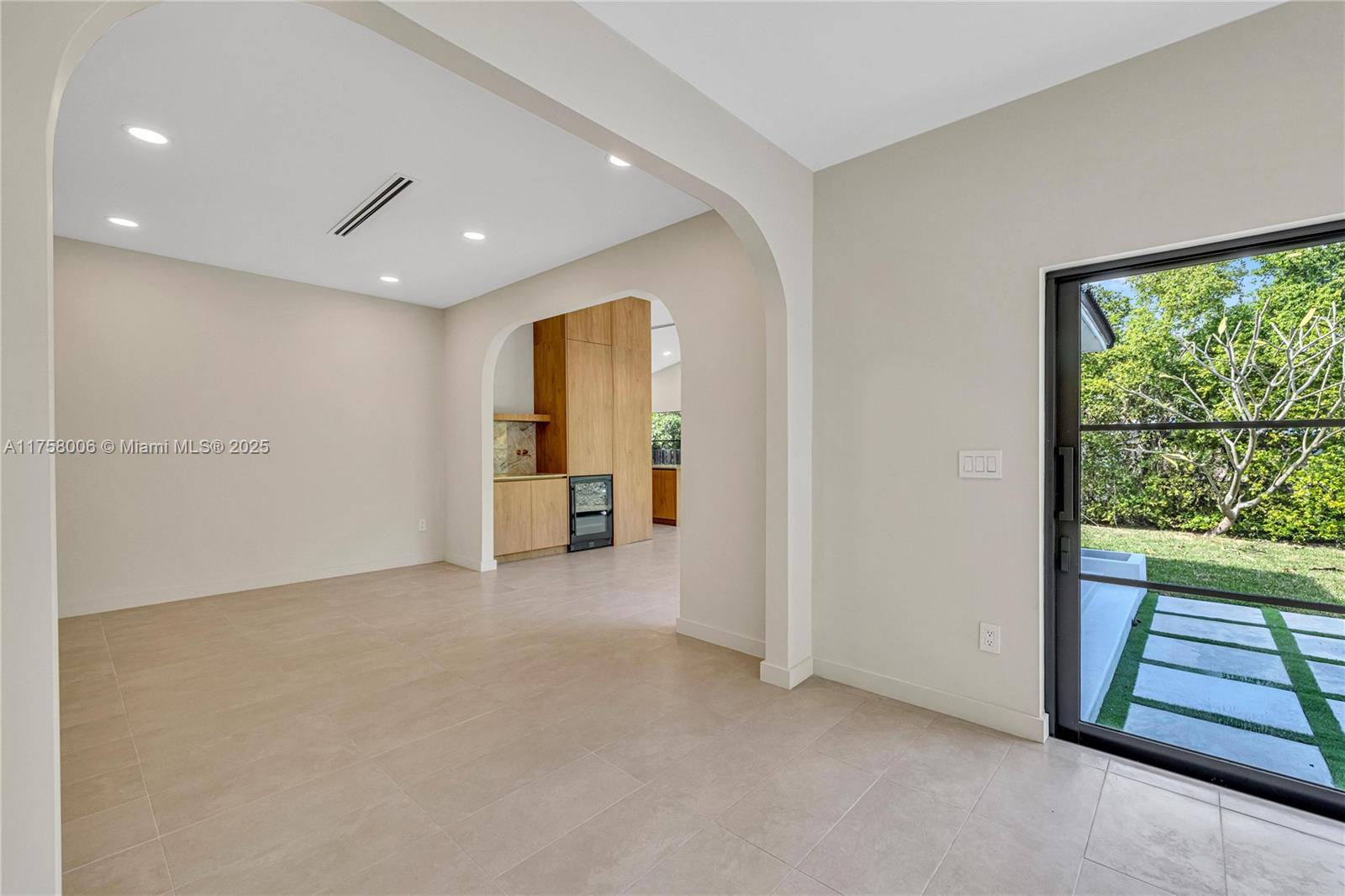 1323 Cleveland Road Miami Beach, FL 33141 - Photo 21 of 43 a view of a livingroom with a staircase
