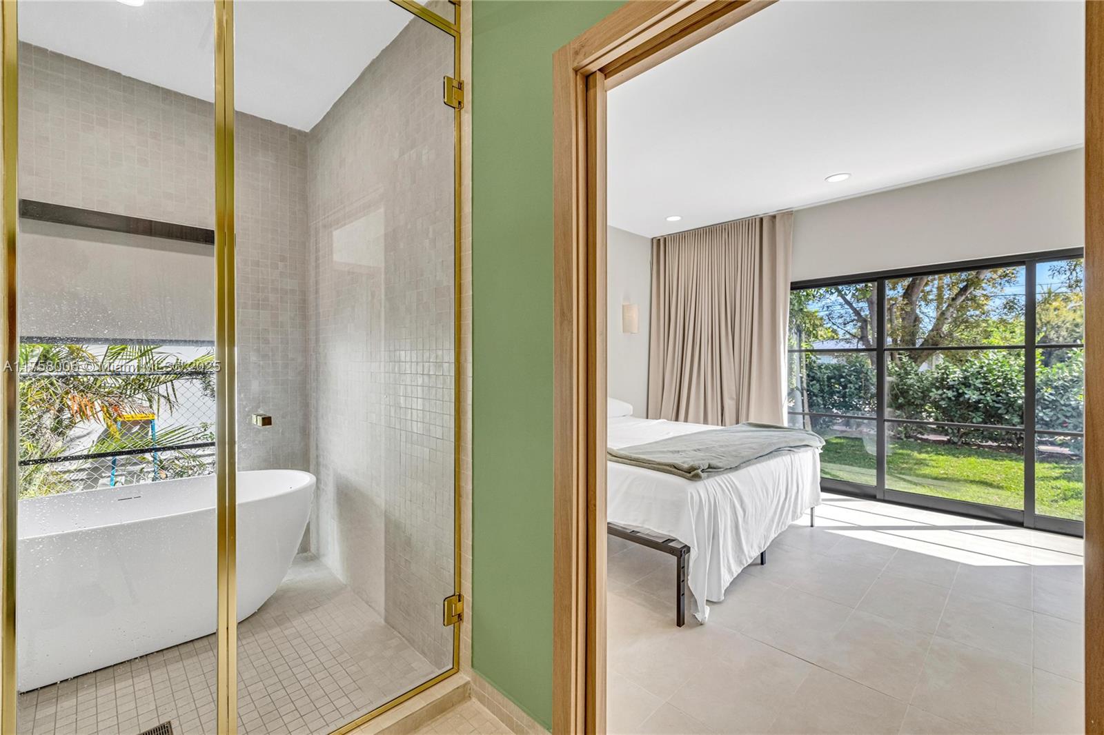 1323 Cleveland Road Miami Beach, FL 33141 - Photo 25 of 43 a bathroom with a granite countertop sink and mirror