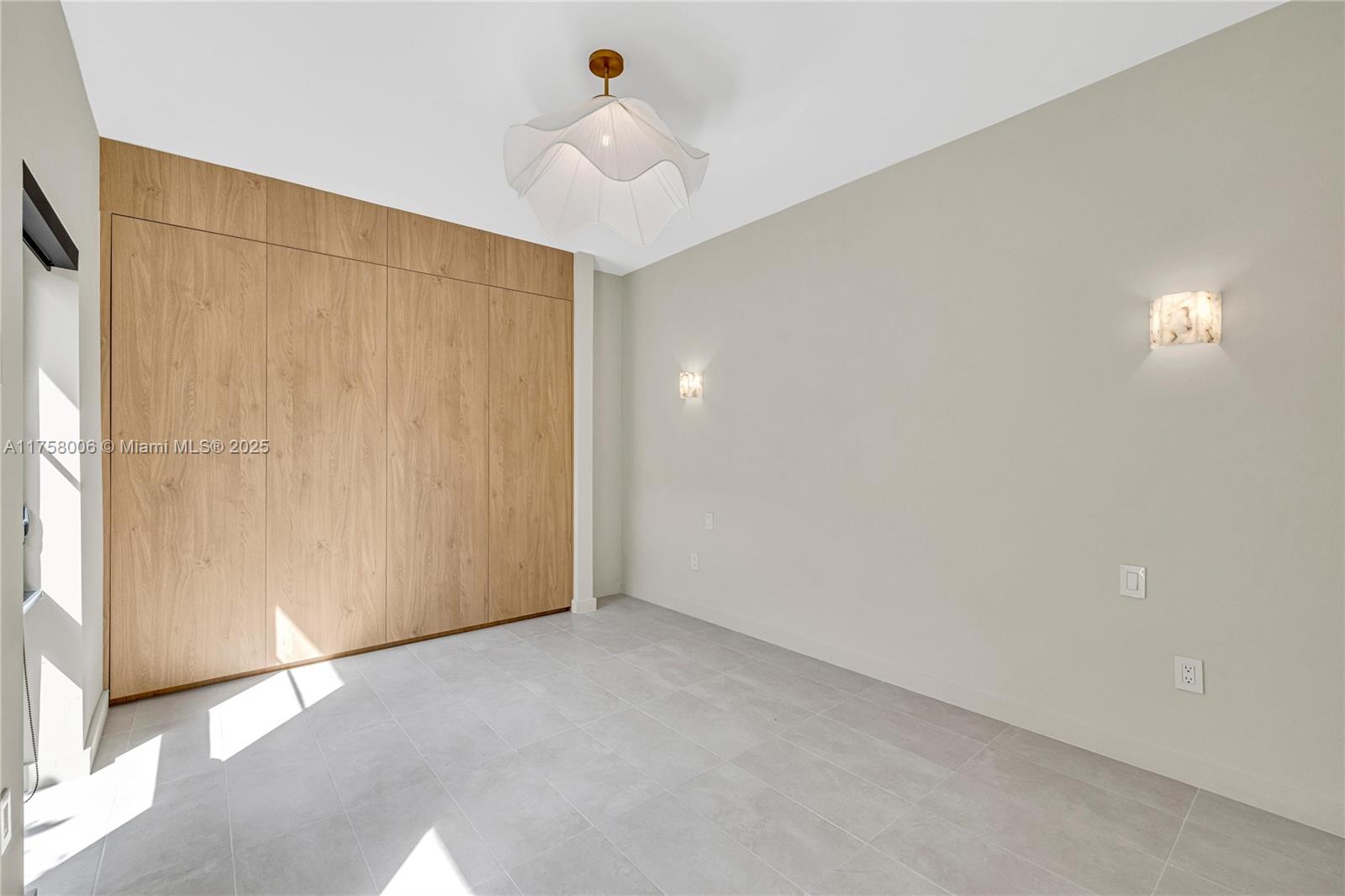 1323 Cleveland Road Miami Beach, FL 33141 - Photo 34 of 43 a view of an empty room