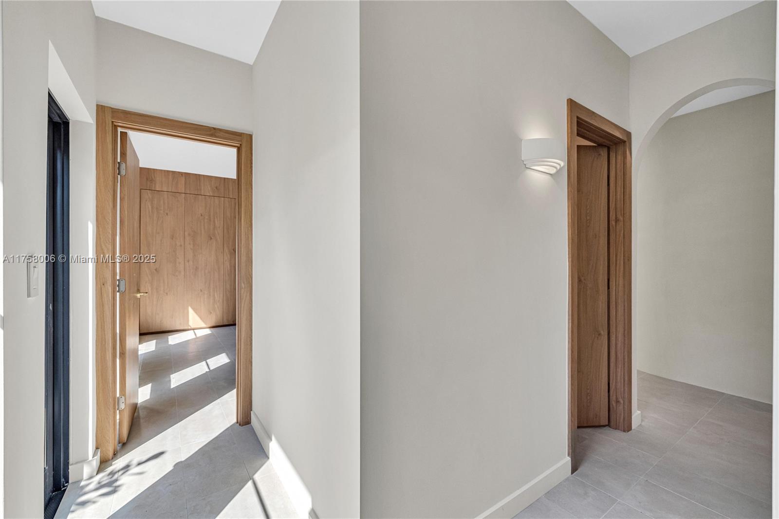 1323 Cleveland Road Miami Beach, FL 33141 - Photo 38 of 43 a view of a glass door and a glass door