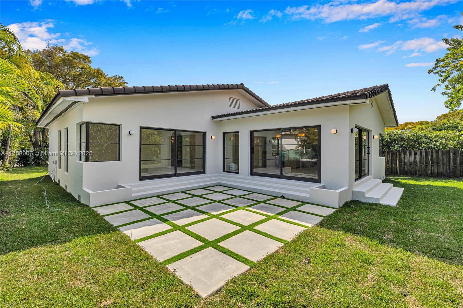1323 Cleveland Road Miami Beach, FL 33141 - Photo 39 of 43 a view of house with yard and outdoor seating