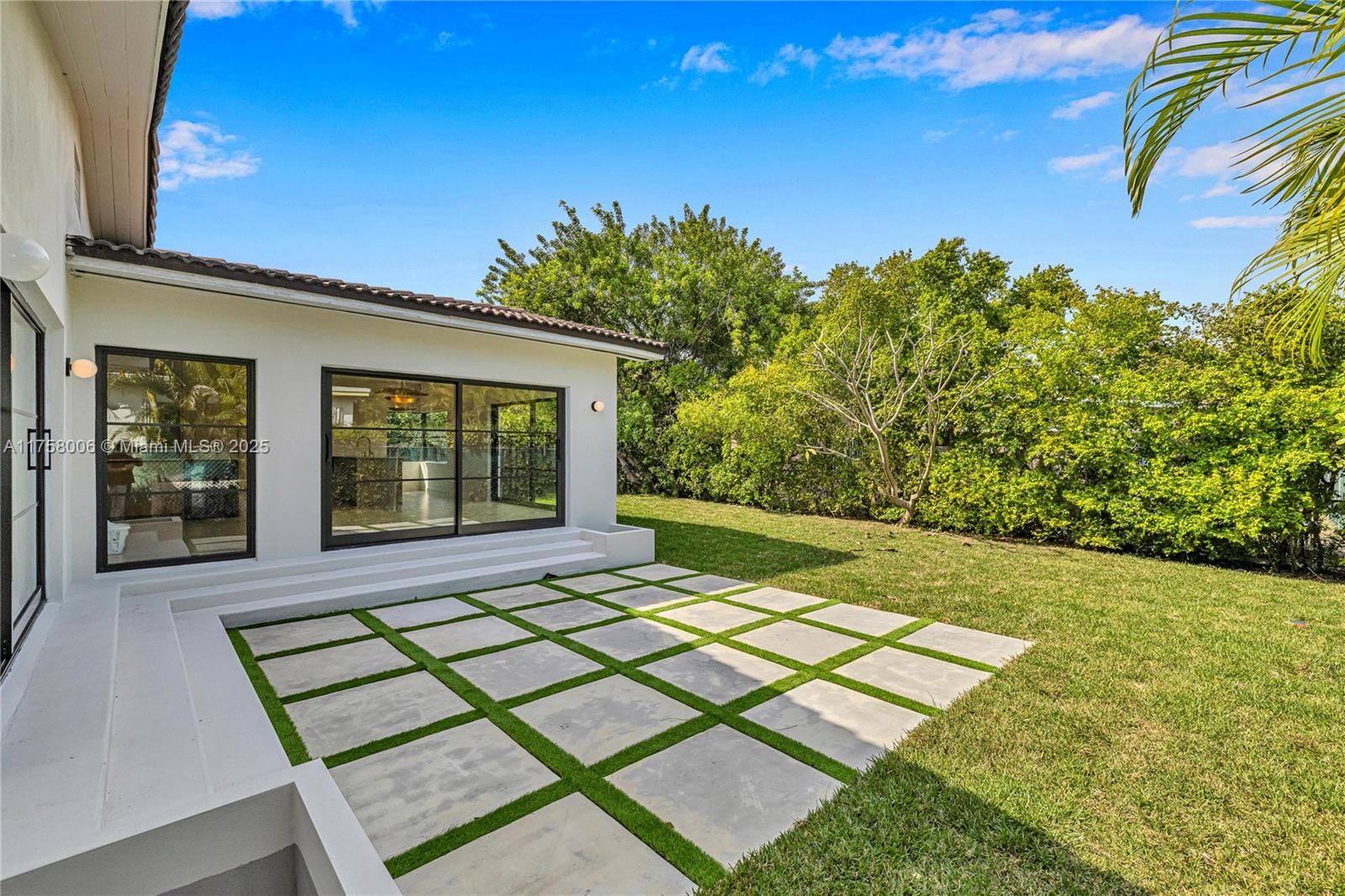 1323 Cleveland Road Miami Beach, FL 33141 - Photo 40 of 43 a view of an house with backyard space and balcony