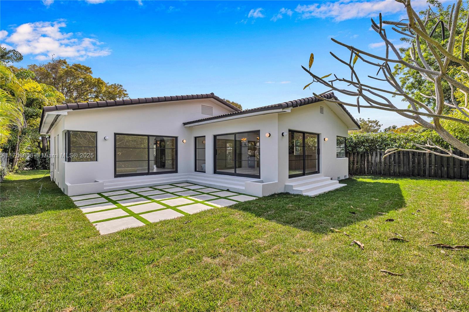 1323 Cleveland Road Miami Beach, FL 33141 - Photo 41 of 43 a view of a house with a backyard
