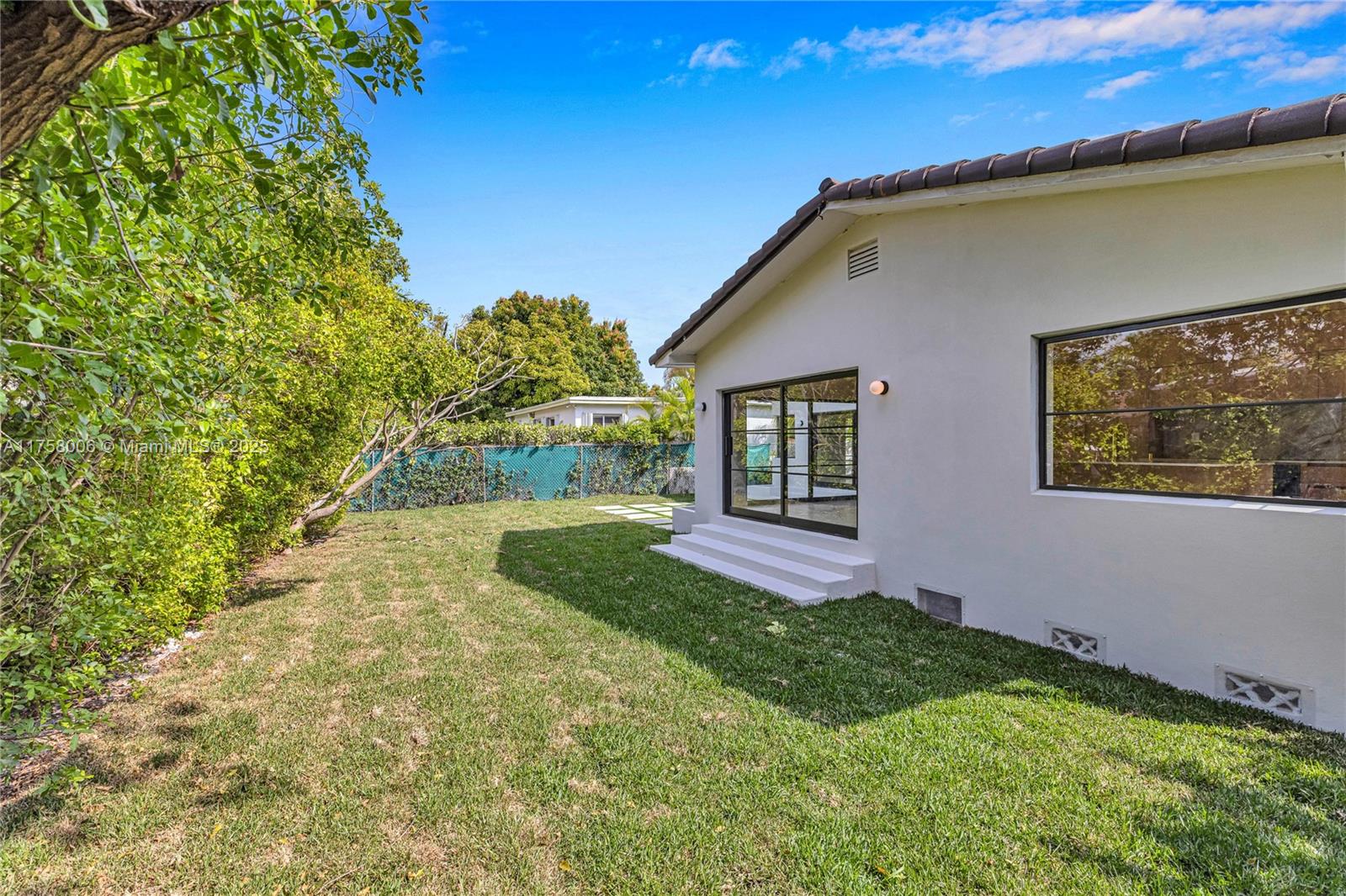 1323 Cleveland Road Miami Beach, FL 33141 - Photo 42 of 43 a view of backyard with a garden and plants