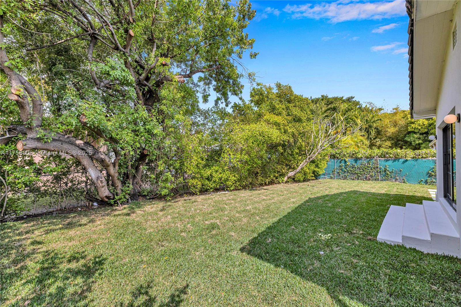 1323 Cleveland Road Miami Beach, FL 33141 - Photo 43 of 43 a view of a yard with an trees