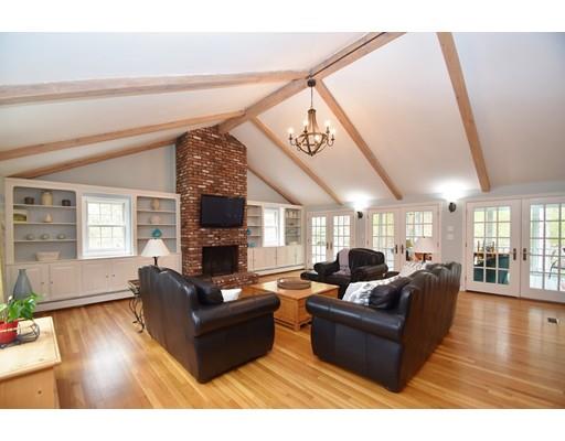 180 Rowley Bridge Road Topsfield, MA 01983 - Photo 13 of 30 a living room with fireplace furniture and a wooden floor