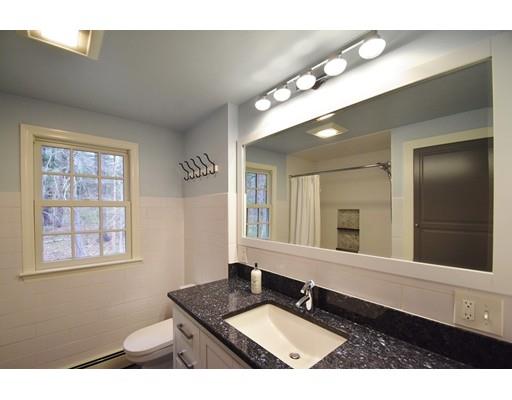 180 Rowley Bridge Road Topsfield, MA 01983 - Photo 19 of 30 a bathroom with a sink a vanity and a mirror