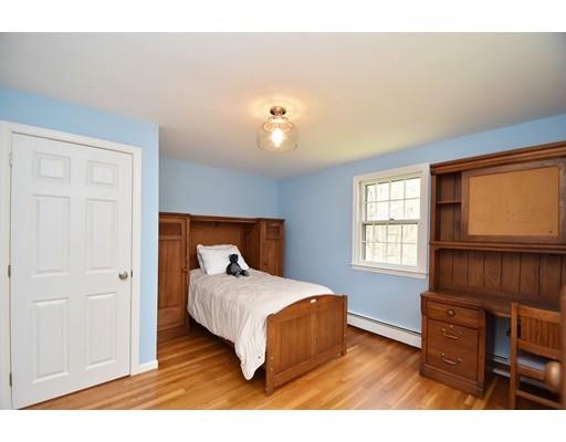 180 Rowley Bridge Road Topsfield, MA 01983 - Photo 23 of 30 a bedroom with a bed and window