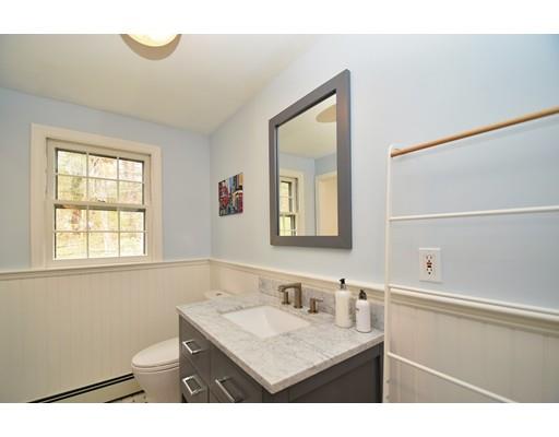 180 Rowley Bridge Road Topsfield, MA 01983 - Photo 24 of 30 a bathroom with a sink vanity granite and a mirror