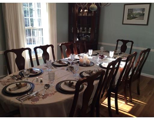 180 Rowley Bridge Road Topsfield, MA 01983 - Photo 5 of 30 a dining room with furniture and chandelier