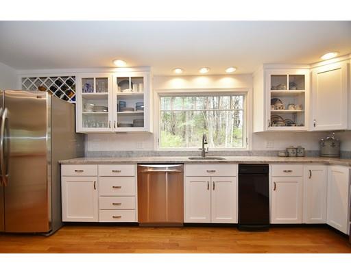 180 Rowley Bridge Road Topsfield, MA 01983 - Photo 8 of 30 a kitchen with granite countertop a sink stainless steel appliances and cabinets