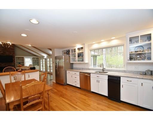 180 Rowley Bridge Road Topsfield, MA 01983 - Photo 10 of 30 a large kitchen with lots of counter space and windows