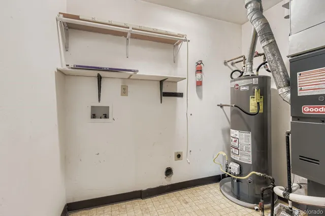 a room with cabinets and wooden floor