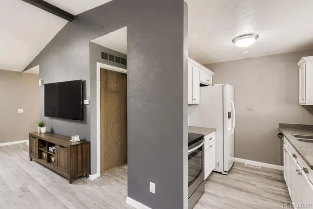 a room with a bed and a television in it