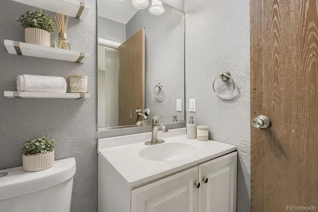 a bathroom with a sink and a toilet