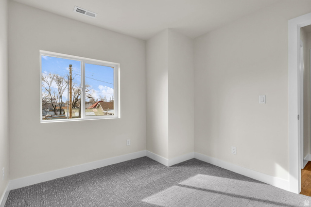 578 West 7th Midvale, UT 84047 - Photo 21 of 35 Carpeted empty room featuring baseboards
