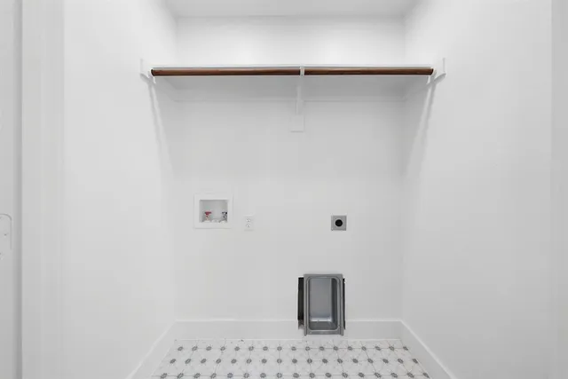 an aerial view of a house with lots of trees