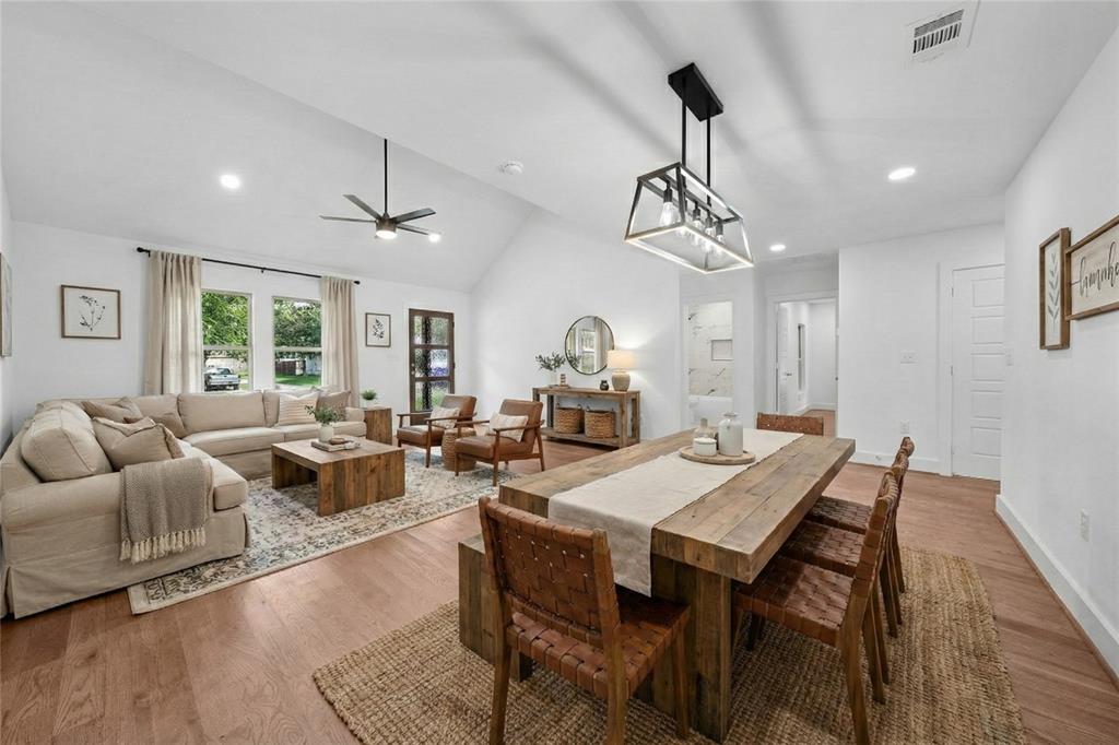 104 Mockingbird Street Ector, TX 75439 - Photo 9 of 40 a view of a dining room with furniture window and wooden floor