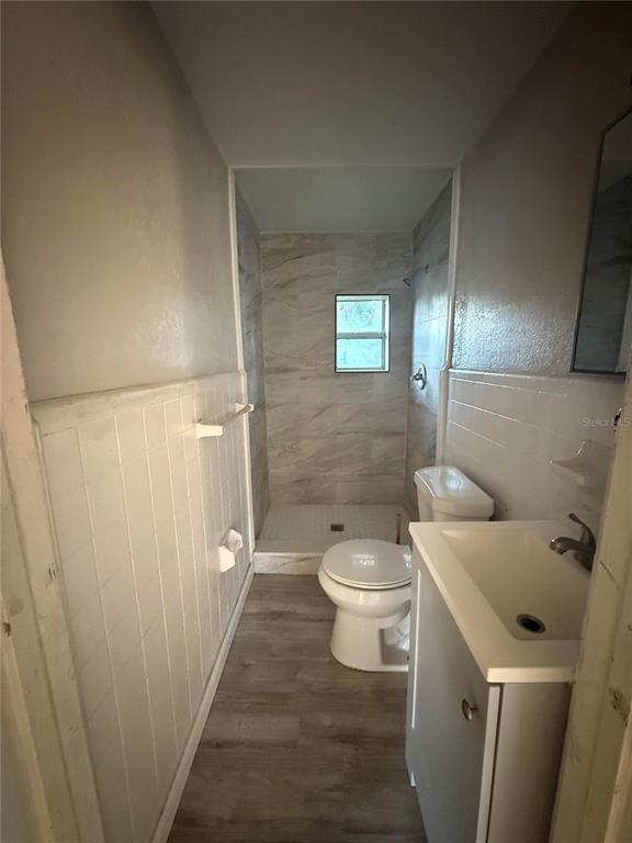 3125 Ave S Northwest, Unit C Winter Haven, FL 33881 - Photo 5 of 7 a bathroom with a toilet and shower