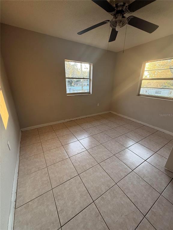 3125 Ave S Northwest, Unit C Winter Haven, FL 33881 - Photo 6 of 7 a view of an empty room with a window