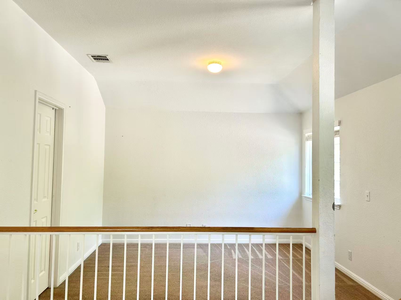 5608 Netleaf Road Austin, TX 78724 - Photo 13 of 26 A well-lit loft area provides flexible space, ideal for a home office or relaxation.