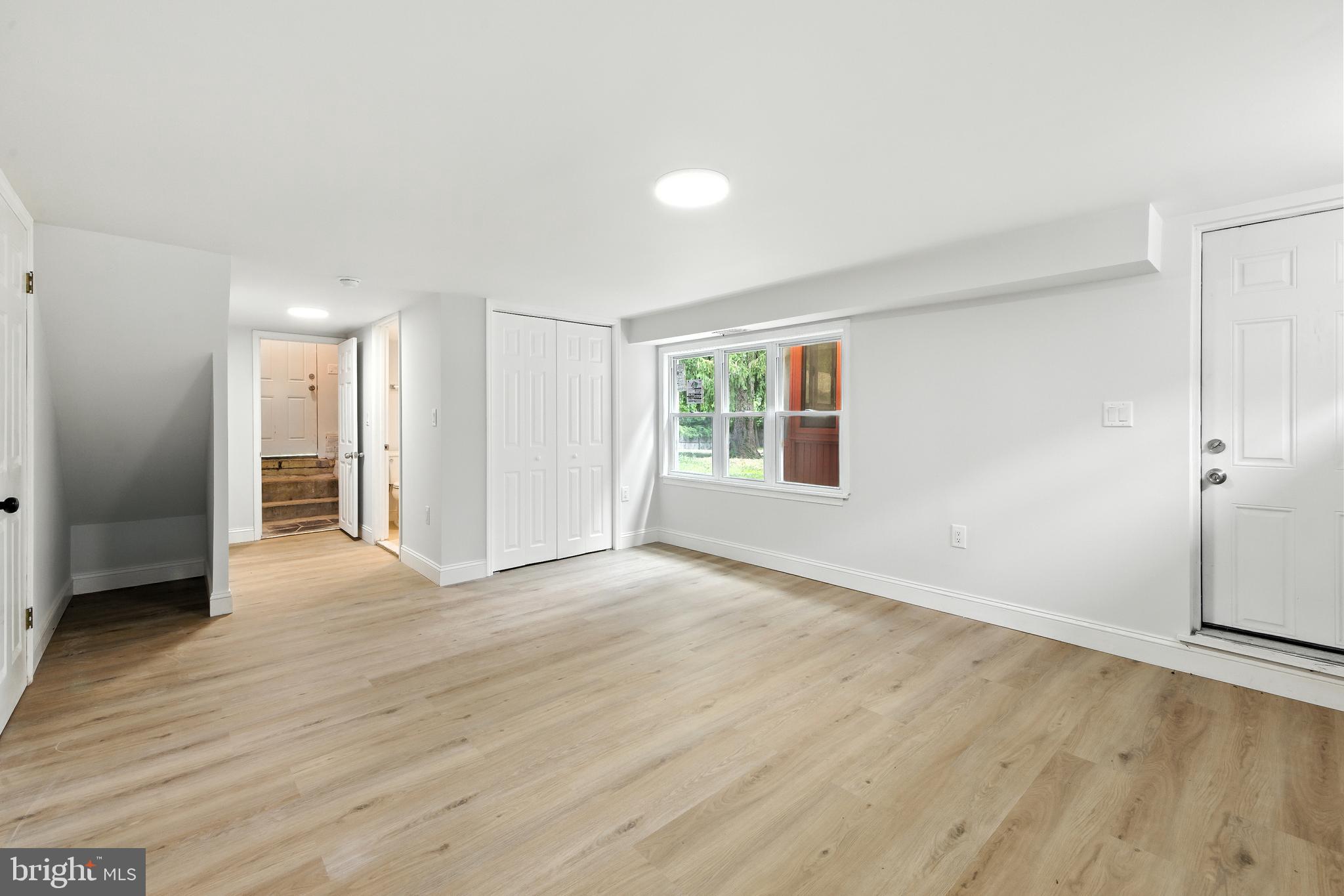 403 South Lenola Road Moorestown, NJ 08057 - Photo 18 of 26 an empty room with wooden floor and windows